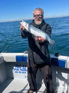 Lone angler fishing in MI waters