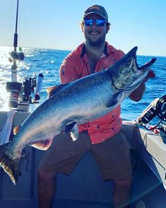 One fisherman in Muskegon enjoying a great fishing day on the water