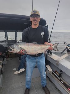 Chinook salmon catch displayed on fishing boat deck in Roseburg Oregon