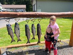 Two people fishing for Chinook Salmon and Bluefish in Oregon