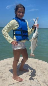 Our Captain welcomes your kids! Redfish Fishing