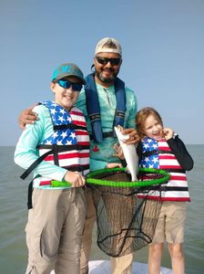 3 people fishing at South Padre Island