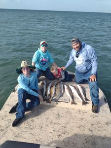 3 people fishing in TX