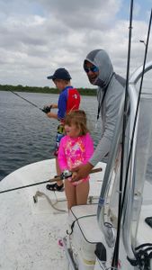 Three people fishing at South Padre Island
