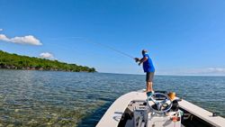 Fly fishing from boat deck in clear waters near Tavernier Florida