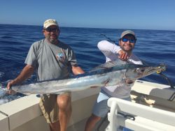 Anglers holding fishing gear in HI