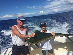 2 people fishing in Kailua-Kona with a 20-inch fish