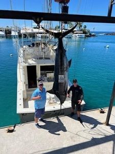 Two people fishing in Kailua-Kona