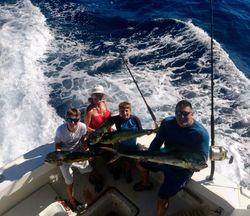 Three big fish caught during a fishing trip in Hawaii