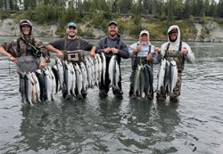 5 people fishing in the scenic coastal town of Port Orford