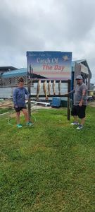 Two people fishing in TX