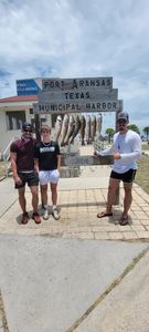 Three people enjoying a fishing trip in TX