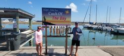 Two people enjoying a fishing trip in Rockport