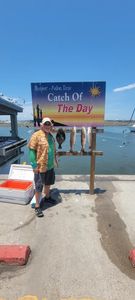 Angler with fishing rod at Rockport