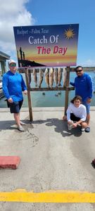 Three people fishing in Rockport