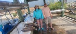 Two people fishing in TX