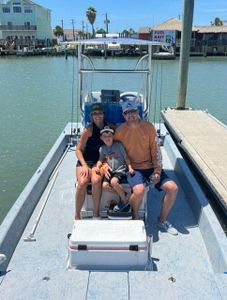 Three people fishing in TX