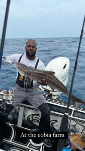 Angler with big 24-inch catch fishing in FL