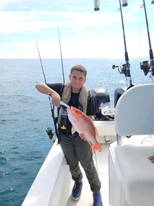 Angler holding a 15-inch fish in NC
