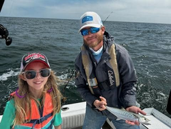 A Spanish Mackerel, an 8-inch fish, caught while fishing in NC.