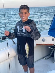 Angler fishing in the waters of Port Clinton
