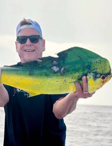 Angler catching a 19-inch fish in Vero Beach