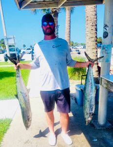 Two mahi mahi and spanish mackerel fish caught while fishing in Vero Beach
