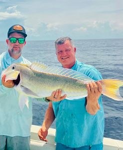 Two anglers fishing in Florida catching the best, great catches