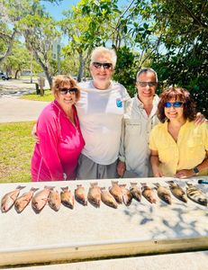 Four people fishing in FL