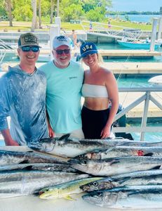 4 king mackerel fish, 36 inches long, caught fishing in FL