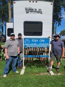 Three people enjoying a fishing trip at Lakeside Marblehead
