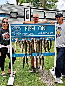 Three people enjoying a day of fishing at Lakeside Marblehead