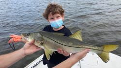 Kid caught his own Snook