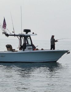 An angler fishing in the waters of Wells