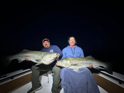Two anglers fishing in Maine with best great fishing