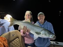 Striped bass caught by two anglers in Wells