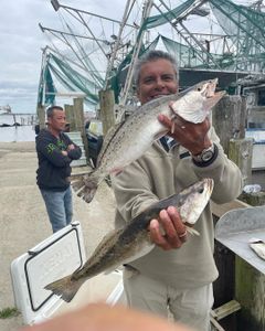 2 spotted weakfish, 48 inches long, fishing in LA