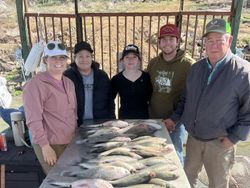 Five people fishing at Tow