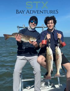 Father and son on some red action. 
