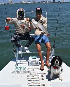 2 redfish and spotted weakfish, fishing in Brownsville