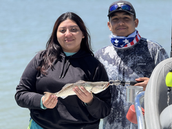 Enjoying a peaceful day on the water with our catch.
