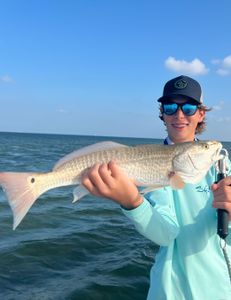 First Redfish for this avid  bass fishing young angler from Dallas, TX. . Making memories and getting hooked on some saltwater fishing ! Fish on! June 27, 2024 SPI 