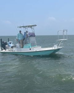 Angler holding a large garfish caught in Brownsville