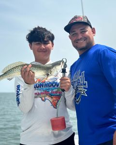 Spotted weakfish caught by two people in Brownsville