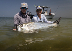 Two people fishing at Fort Myers Beach