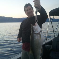 Angler with a 21-inch fish in Tahoe Vista