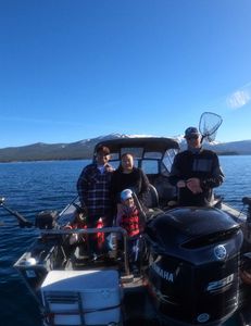 4 people enjoying a fishing trip in Tahoe Vista