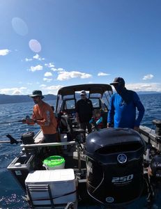 Four people enjoying a day at the lake in Tahoe Vista