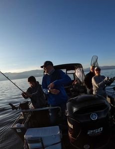 4 people fishing in CA