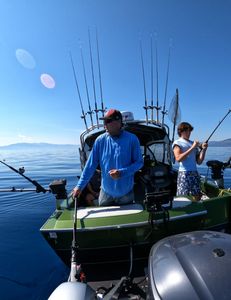 Two people enjoying fishing in CA